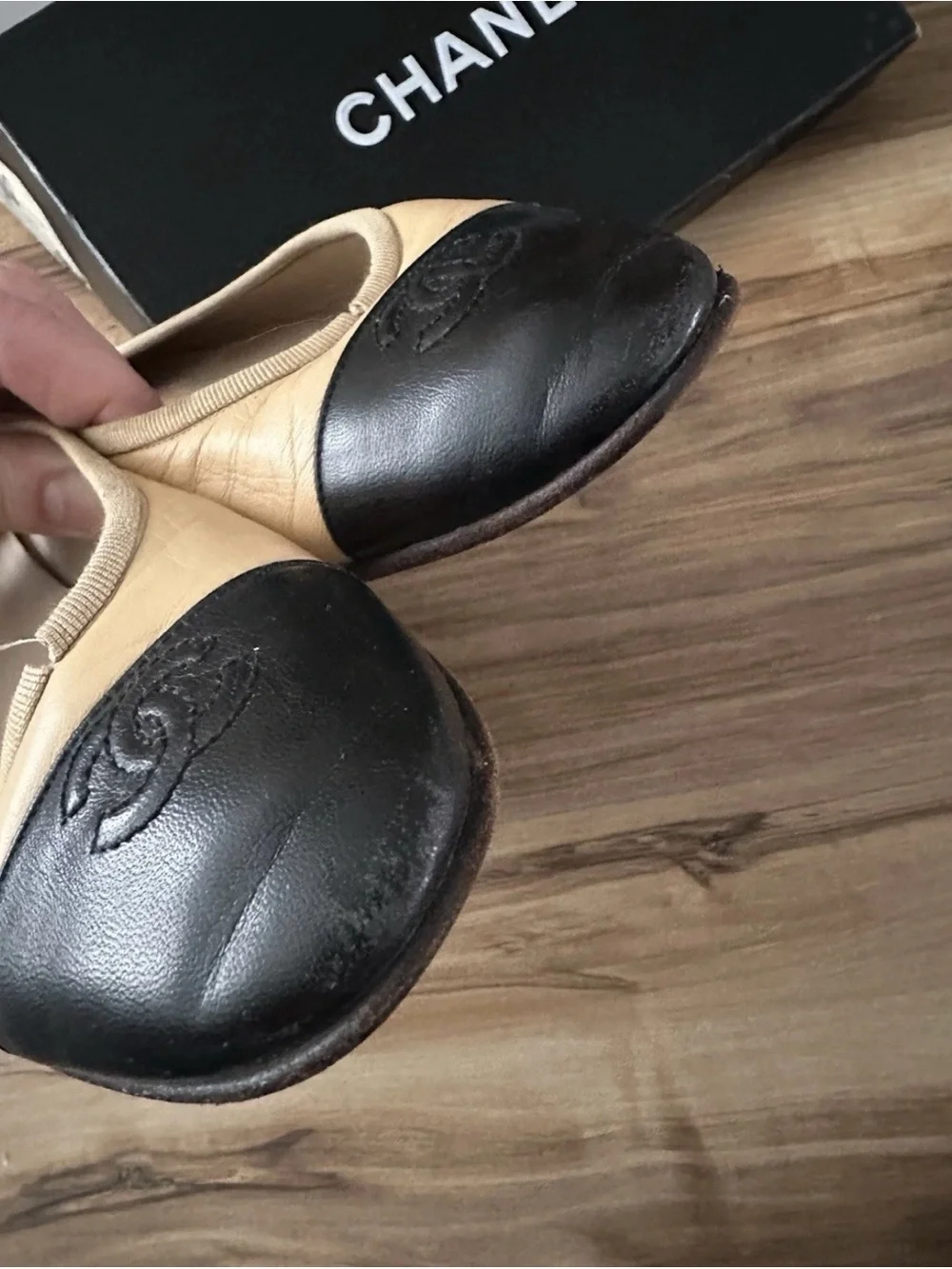 CHANEL Beige Leather Ballet Flats with Black Cap Toe